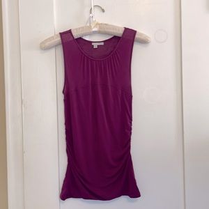 Blackberry sleeveless spandex shell, partially sheer, ruched sides